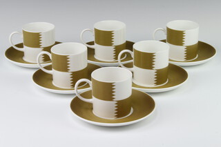 Six Susie Cooper coffee cans and saucers Heraldry Old Gold C2112 