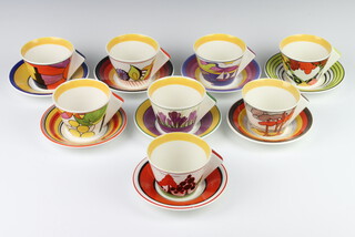 A set of 8 Wedgwood, Royale Stratford Fantasque Clarice Cliff tea cups and saucers - Apples, Trees and House, Lilac Crocus, Gibraltar, Honolulu, Sunday, Devon and Coral Firs, all boxed some with damp damage 