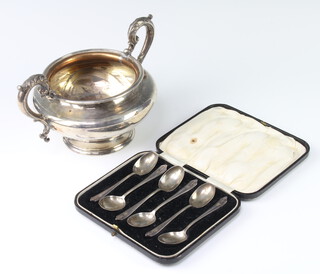 A cased set of 6 silver coffee spoons 56 grams and a silver plated sugar bowl 