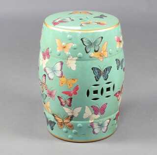 A 20th Century Chinese ceramic garden barrel seat decorated with butterflies 45cm 