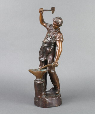 A late 19th Century bronze figure of a standing blacksmith an at anvil, indistinctly signed 39cm h x 10cm 