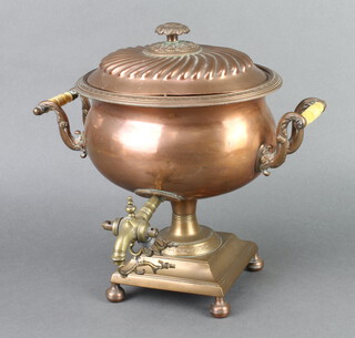 An oval Georgian copper and brass twin handled tea urn, raised on a square base 33cm h x 30cm w x 13cm d, the interior of the lid marked Warranted London Manufacturer 