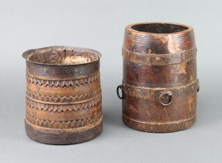 Two Eastern circular wooden and metal mounted vases/barrells 20cm h x 14cm diam. and 16cm x 15cm 