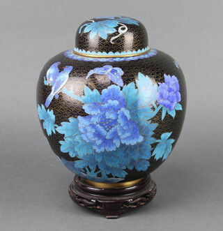 A Chinese black and blue enamelled cloisonne jar and cover with hardwood stand 22cm x 20cm 