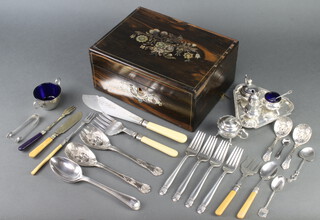 A Victorian coromandel work box containing a quantity of silver plated wares 