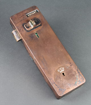 A copper penny in the slot lavatory door lock 13cm h x 10cm w x 4cm d together with a collection of various pennies  