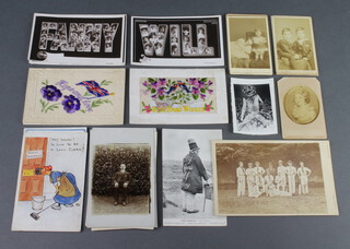 Three First World War embroidered postcards together with a collection of other postcards 