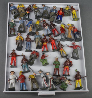 Thirty nine Britains figures including cowboys 
