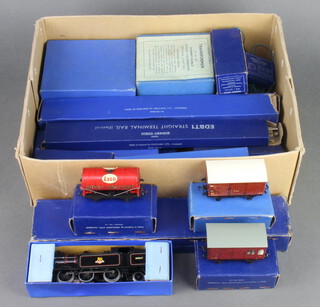 A Hornby Dublo British Railways tank locomotive 31017 EDL17, ditto horsebox 32060 D1, coal wagon high sided 32030 D2, fish van D1, oil tank 32070 D1, open wagon 32075 D1, all boxed together with a Hornby Controller, transformer and various track all boxed  