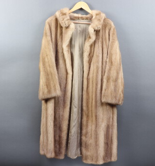 A blonde mink coat (some molt) together with a mink stole and 3 mink collars 