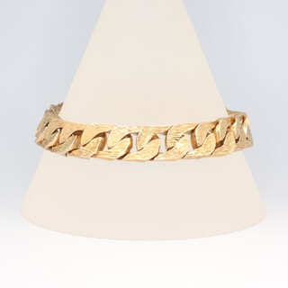 A 9ct yellow gold bark finished flat link bracelet 57.9 grams 