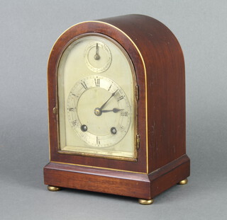 Coventry Astral, an 8 day striking bracket clock with arched silvered dial, contained in a mahogany arched case, the back plate marked O Coventry Astral 3677 Made in England 21cm h x 15cm w x 12cm d  