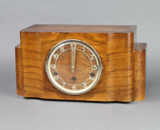An Art Deco 8 day chiming mantel clock with pierced silvered dial and Arabic numerals contained in a figured walnut case, complete with key and pendulum  21cm h x 39cm w x 17cm d 