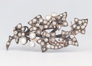 A yellow and white metal diamond and seed pearl spray floral brooch 48mm x 24mm, 8.3 grams