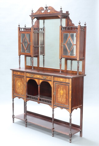 A Victorian inlaid mahogany chiffonier sideboard with raised mirrored back flanked by a pair of cupboards enclosed by glazed panelled doors, the base fitted a drawer above recess, flanked by a pair of cupboards with potboard beneath 215cm h x 136cm w x 38cm d 