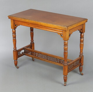 A late Victorian rectangular walnut card table raised on turned supports with pierced stretcher 75cm h x 91cm w x 45cm d 