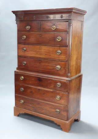 A Georgian oak chest on chest with moulded and dentil cornice, the upper section  fitted 2 short and 3 long drawers flanked by columns to the sides, the base with 3 long drawers, raised on bracket feet, the right hand short drawer is marked David George cabinet maker made this anno domini 1811 May 8th, raised on bracket feet 187cm h x 111cm w x 52cm d  