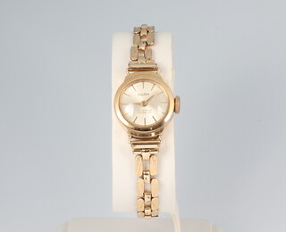 A lady's Fuldex 9ct gold wristwatch on a gilt bracelet 
