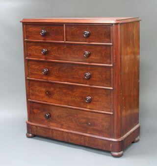 A Victorian mahogany chest of 2 short and 4 long drawers, raised on bun feet 137cm h x 121cm w x 56cm d 