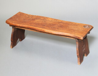 Harry Tonkin, a rectangular carved oak bench raised on standard end supports 33cm h x 91cm w 29cm d, the top carved a tudor rose and supports carved with a Canterbury cross, base marked designed and carved by Harry Tonkin Corran, Cornwall and signed to the side Corran July 1955 