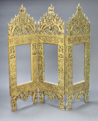 An Eastern pierced gilt painted hardwood screen decorated deities, 137cm h x 45cm w when closed x 135cm when open 
