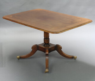 A Georgian inlaid and crossbanded mahogany breakfast table, raised on a turned column and platform base with outswept supports ending in paw feet, complete with bolts 74cm h x 131cm w x 91cm d 
