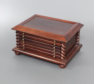 A rectangular mahogany collectors chest of 5 drawers with spiral turned columns to the side raised on bun feet 26cm x 50cm x 40cm 