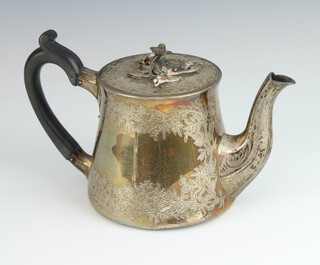A Victorian silver breakfast teapot engraved with scrolling leaves with floral finial and ebony mounts London 1838, maker Robert Garrard II, gross weight 590 grams 