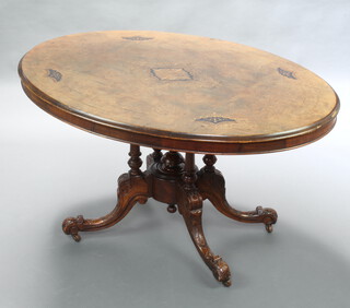 A Victorian oval inlaid figured walnut Loo table, raised on 4 column columns and outswept supports, complete with bolts 70cm h x 134cm w x 98cm d 