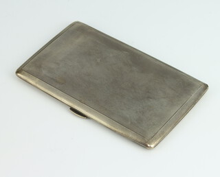 A silver engine turned rectangular cigarette case Birmingham 1961, gross weight 214 grams