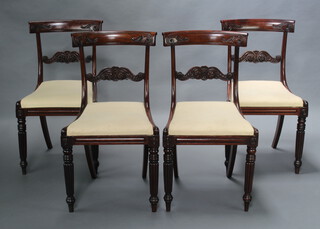 A set of 4 William IV carved mahogany bar back dining chairs with shaped mid rails and drop in seats, raised on turned and reeded supports 84cm h x 47cm w x 44cm d (seat 26cm x 32cm) 