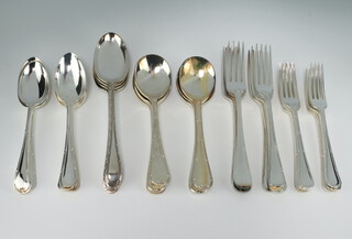 A canteen of silver plated ribbon and bow pattern cutlery comprising 8 dessert forks, 8 dinner forks, 8 soup spoons, 8 dessert spoons and 4 tablespoons 