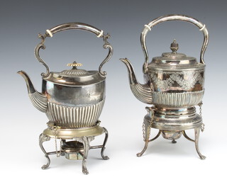 An Edwardian silver plated tea kettle on stand with burner decorated with leaves, a smaller ditto demi-fluted 