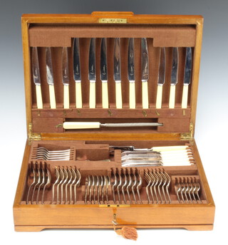 A canteen of silver plated cutlery for 6 contained in a walnut canteen comprising 73 pieces, missing 1 teaspoon 