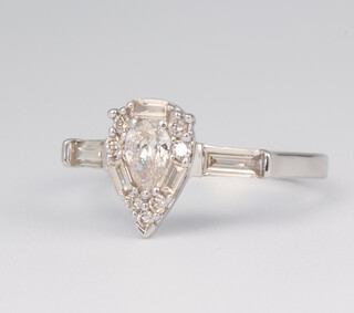 A 9ct white gold pear shaped cluster ring of brilliant baguette cut diamonds approx. 0.9ct, size N, 2.8 grams