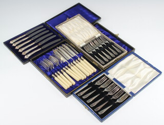 A cased set of 6 silver plated fish forks and 3 other cased sets and a plated manicure set 