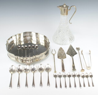 A silver plated circular 2 handled galleried tray 30cm, a mounted ewer and minor plated wares 