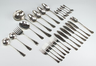 A quantity of ribbon and bow silver plated cutlery comprising 6 fish knives, 6 fish forks, 4 serving spoons, a soup ladle, 2 sauce ladles, 6 coffee spoons, a stilton scoop and a serving spoon and fork 