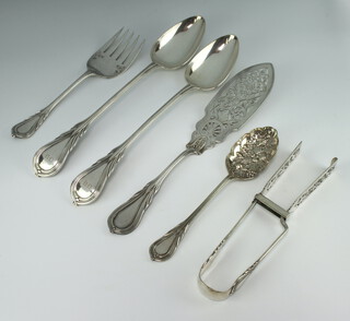 A pair of silver plated lily pattern basting spoon, a berry spoon, an asparagus server and a pair of fish servers 