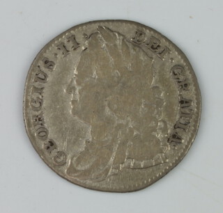 A George II sixpence with roses 1743 