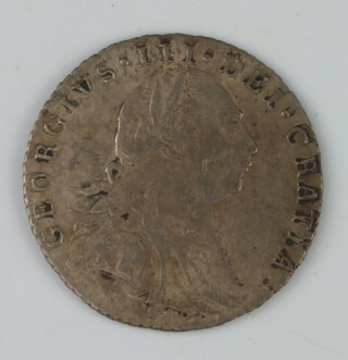 A George III sixpence without hearts 1787 