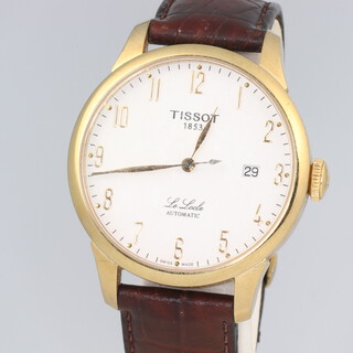 A Gentleman's gilt cased Tissot automatic calendar wristwatch on a leather strap 
