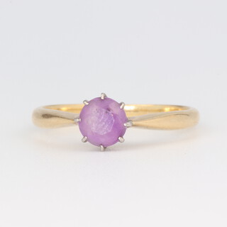A yellow metal amethyst ring size P 1/2, 2.7 grams