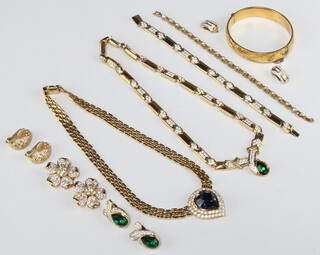 A gilt bangle, a costume necklace with matching earrings and bracelet and other minor costume jewellery