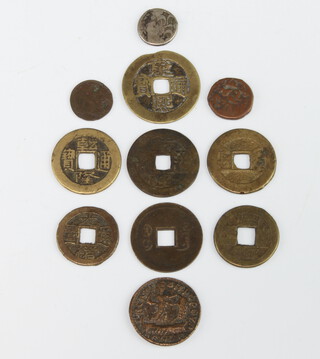 Seven Chinese cash coins, 3 early copper coins and a silver ditto 