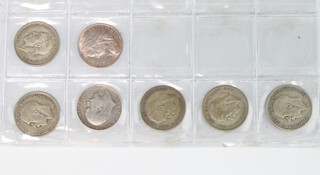 An 1893 half crown and 6 others