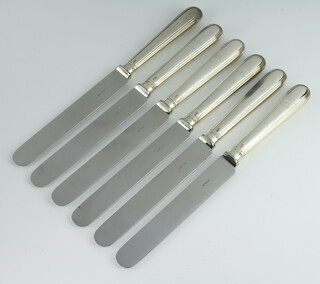 A set of 6 Georgian silver handled table knives London 1810 with engraved monogram M, with replaced steel blades 