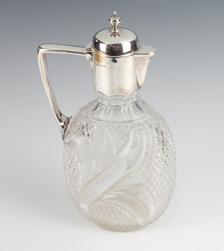A Victorian silver mounted claret jug, the body with leaf decoration, Sheffield 1891, 24cm 