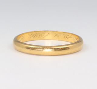A yellow metal stamped 900 wedding band, 5 grams, size Y