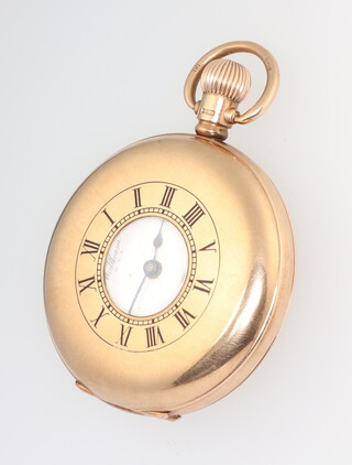 A gentleman's 9ct yellow gold Waltham half hunter pocket watch with seconds at 6 o'clock, the case with presentation inscription, the movement stamped Marquis Waltham.Mass and numbered 21769016, 50mm case, Birmingham 1922